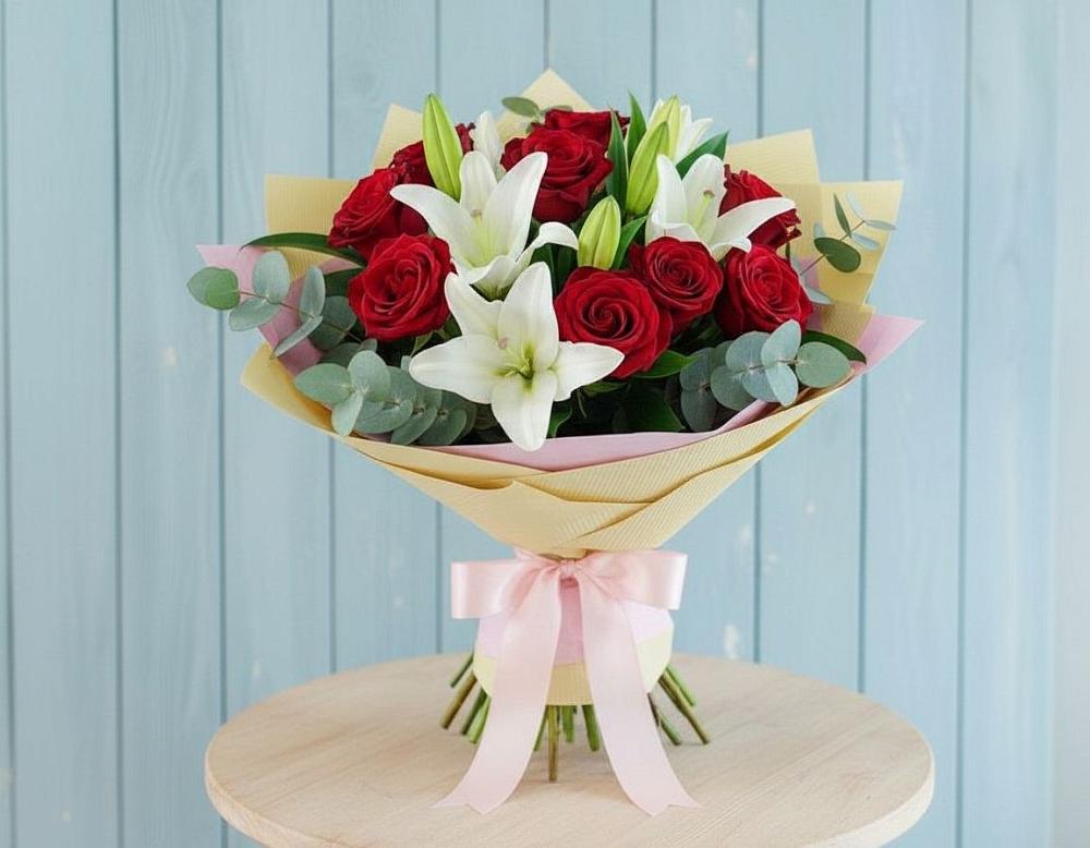 Букет цветов из: Лилии и Розы в Русской Гвоздевке